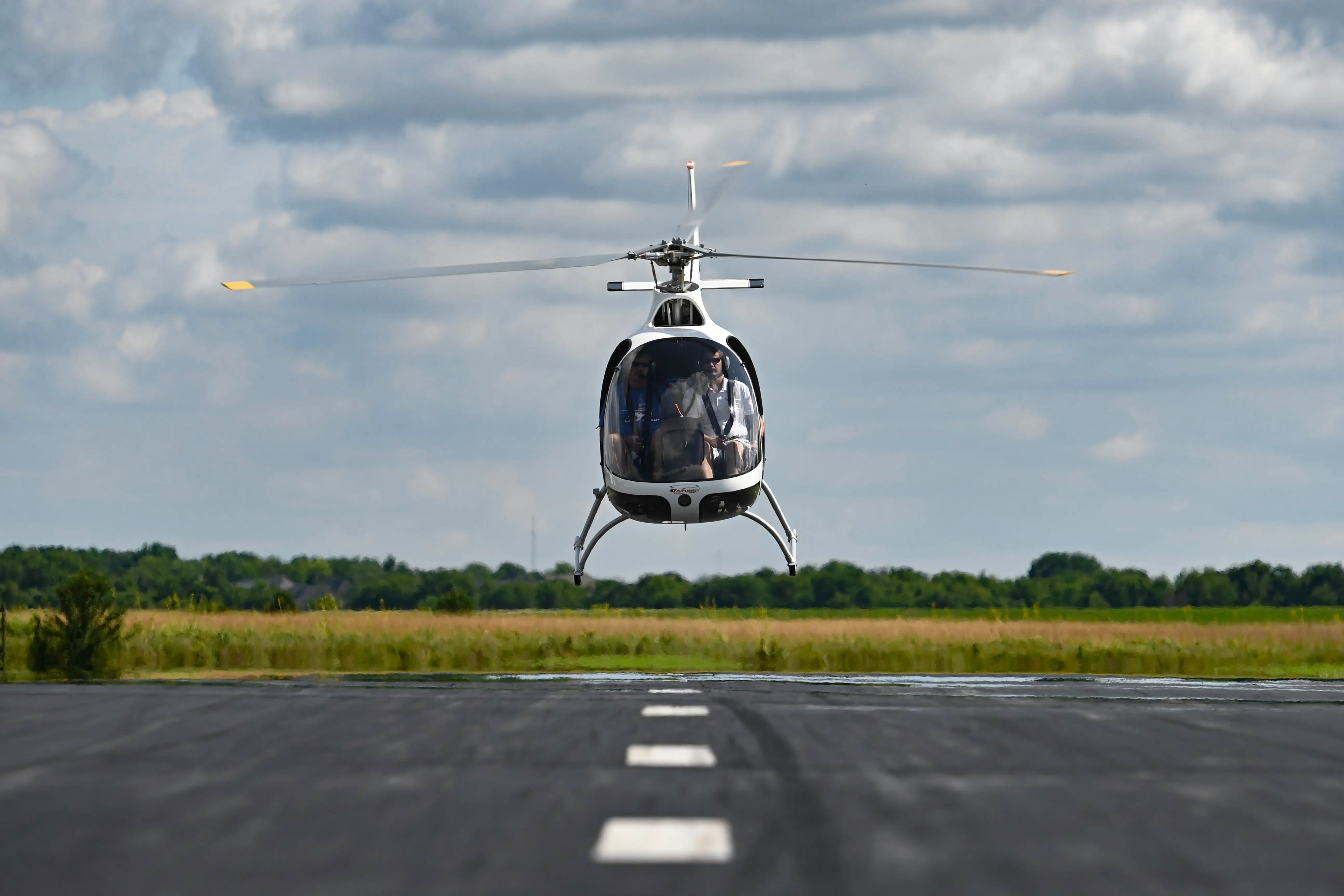Helicopter flying over Dallas skyline