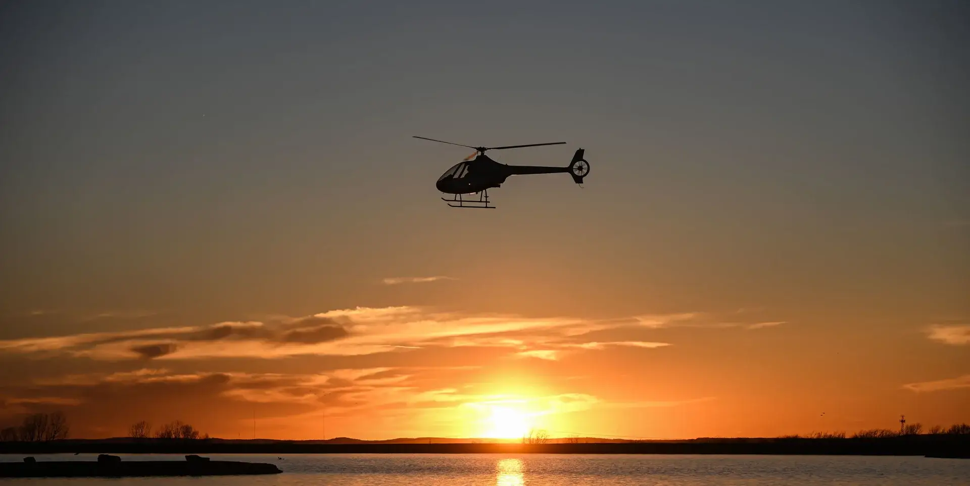 TruFlight helicopter in the sunset