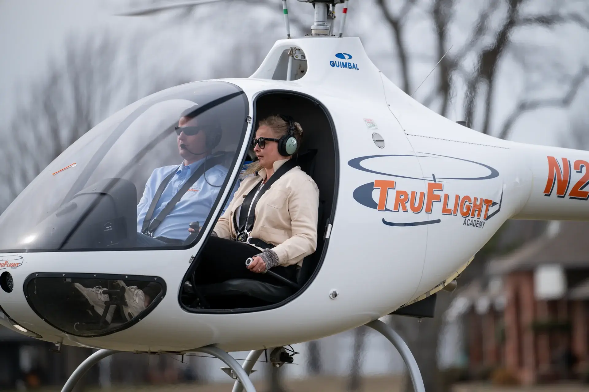 Student and flight instructor training together in a Guimbal Cabri G2 helicopter